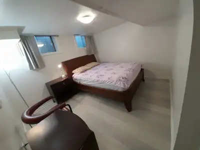 A brand new private daily room with a queen-size bed
