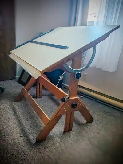 Vintage 1980s Drafting Table with steel T-square attachment and pencil tray. Solid wood, top and hei...