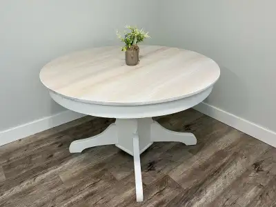 This dining table top had been white washed allowing the wood grain to show through in a beautiful w...
