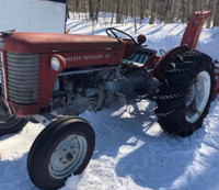 Tractor with snowblower and grader