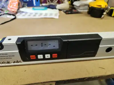 2- foot digital level, takes 2 AAA batteries, has spirit levels and comes with carry case. Asking $3...