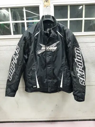 Jacket is XL Pants are 2XL. They have zippers and Velcro up the legs Boots are Skidoo Size 13. They...