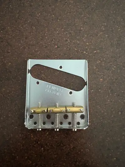 Selling official Fender Telecaster bridge plate with brass saddles Looking for $50 OBO, no trades, p...