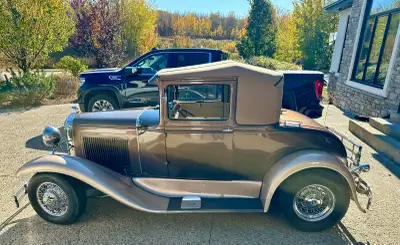 Drive Line: This vehicle is equipped with a Chevrolet 350 cubic inch V8 with four-barrel carburetor....