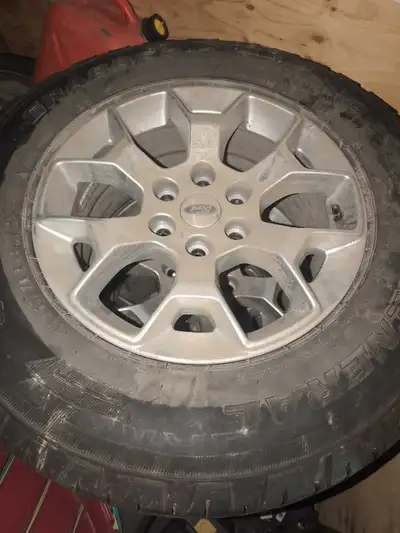 Off a 2021 f-150. Tires good for 2 more seasons. All center caps are present and tpms sensors work L...