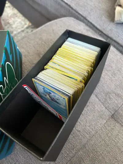 Bulk pokemon cards in a random pokemon box There is some random reverse holos etc in the box they ar...