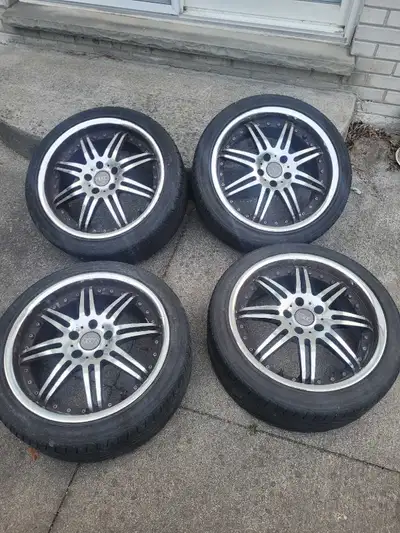 Selling a set of used Audi rims, 18 inches in diameter, complete with Michelin Pilot Sport tires. Th...