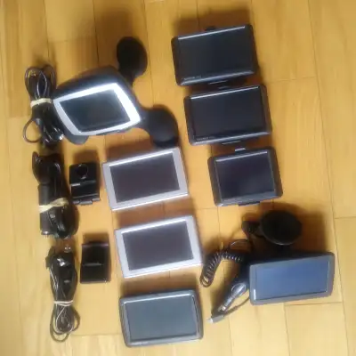 Lot of Garmin GPS X 7, TOMTOM X 1 For parts. Lot of miscellaneous brackets. ALL INCLUDED. See photos...