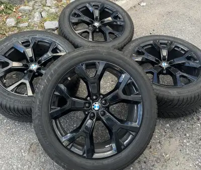 These are Gloss Black OEM BMW X7 Style 752 21" rims and Run-Flat Bridgestone Blizzak LM001 snow tire...
