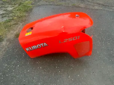 Hood for kubota L2501, small dent(see picture) right hand side. Call 250-401-8872