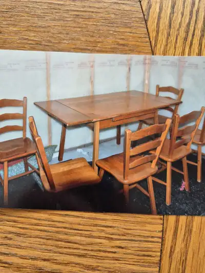 Table ,6chairs hutch and plate rack.solid rock maple. Owned since 1956.in very nice condition