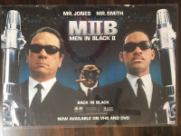 Men In Black items: movie poster, trading cards, magazine