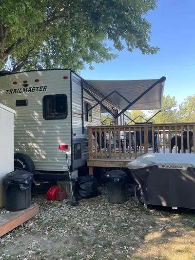 29 Ft Gulf Stream travel trailer, queen bed, lots of storage, pull out double couch, deck and gazebo...