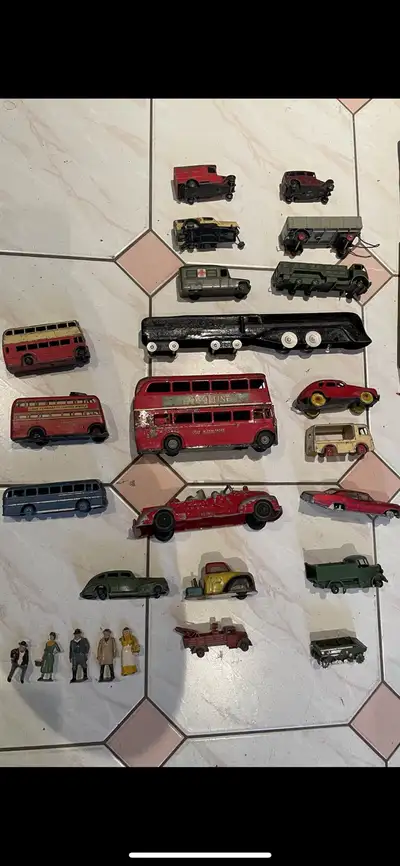 Check out this collection of vintage toy cars! These die-cast vehicles have been well-loved, showing...