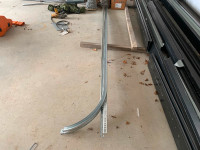 Garage door tracks.  Uprights measure 9’