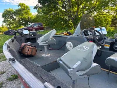 16 ft Lund with 60 hp 4 stroke Suzuki outboard complete with trailer, motor guide bow mount motor wi...
