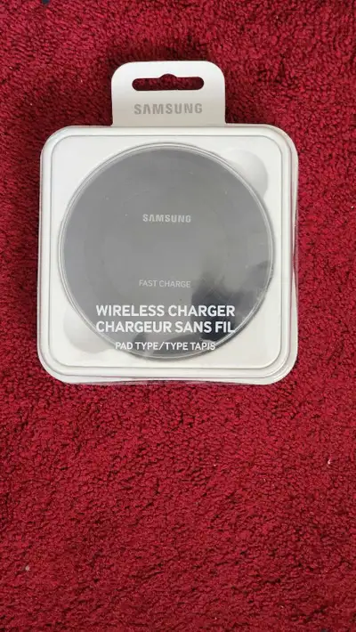 Charge your devices effortlessly with this Samsung Wireless Charger! It delivers fast charging capab...