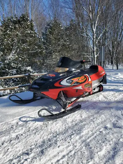I am selling a used Polaris 700 XC Edge snowmobile, perfect for trail riding with its powerful engin...