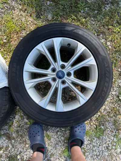 4 Sailun Atrezo Tcon tires and rims that came off of a 2017 Ford Escape thread depth is between 7 an...