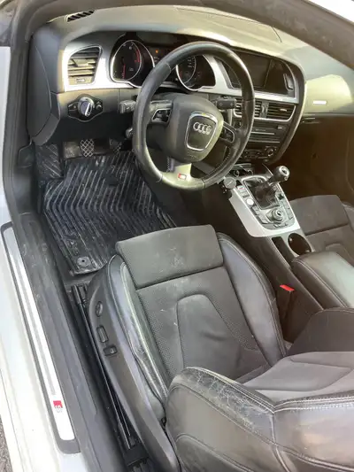 I'm selling my sporty 2011 Audi A5 Coupe, a stylish ride with a manual transmission and a powerful e...