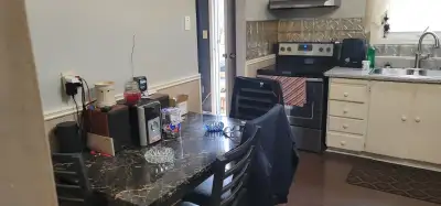 room for rent in a clean and quiet 3 bedroom townhouse. room is furnished with a double bed,dresser,...