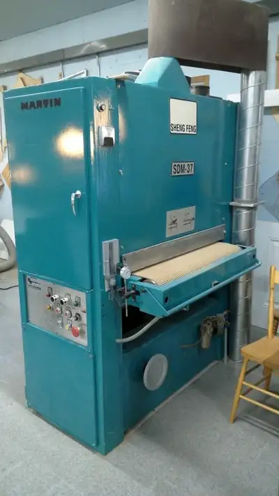 Sheng Feng 36” wide belt sander https://bid.premierauctions.ca/ui/auctions/152831/23312872 We repain...