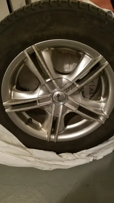 Upgrade your vehicle's winter performance with these reliable, pre-owned Michelin X-Ice winter tires...