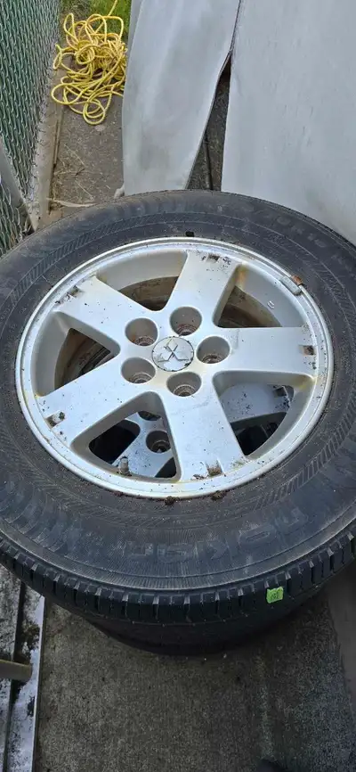 Selling a set of four Mitsubishi Outlander 2007 OEM rims, each fitted with Nokian 215/70R16 100H eNT...