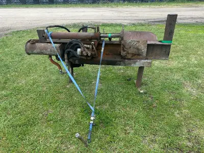 Firewood splitter. For more info call 204 557-3408
