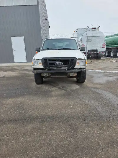 2009 Ford Ranger 2.3L 5 speed RWD Has newer winter tires Has Leer topper Comes with: 3 full size spa...