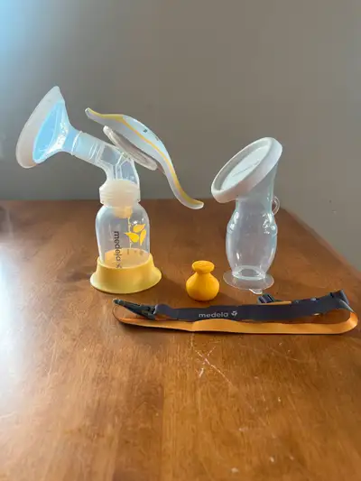 Medela manual pump and silicone milk collector with stopper and lanyard Pickup Yorkton