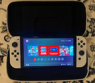 Nintendo Switch OLED like new, View more
