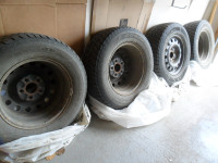 4 Good Year Winter  Tires on Rims.$500.  Was on a Dodge Grand Ca