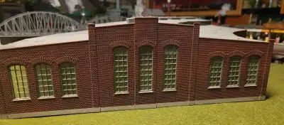 Built model of a six stall train locomotive roundhouse. 1:87 scale. Small roof piece missing has bee...