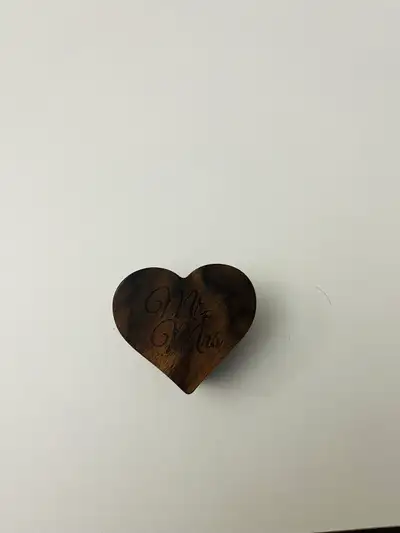 Beautiful wooden heart-shaped ring box with “Mr & Mrs” engraving. Perfect for: • wedding ceremony ri...
