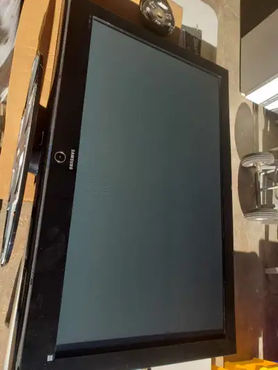 48 inch samsung plasma tv. Slim but very heavy. 48 x 30 inches. Pedestal. Not a smart tv. Great clea...