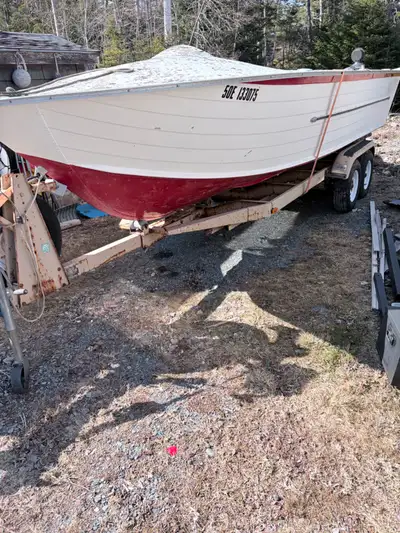 Boats in good shape just needs a floor, the tandem axel trailer is in great shape there is a steerin...