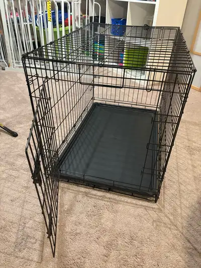Two Amazon Basics dog kennel medium size, View more