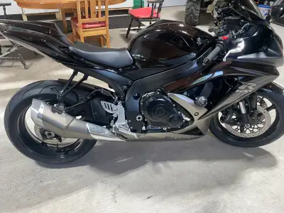 Root beer black. Mint condition. Never raced. Never dropped. No cracks in plastics. Brand new tires....