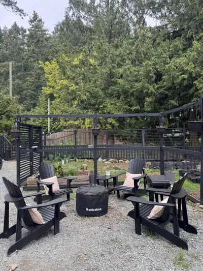 Private trailer/RV pad on a sunny, forested 0.35 acre lot on Mayne Island — perfect for island lifes...