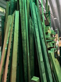 Thousands of board feet of hardwood live edge oak maple mahogony