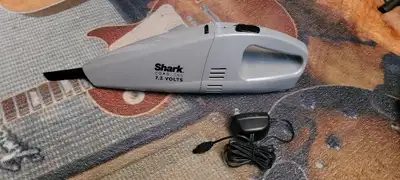 Shark cordless vacuum 7.2 volt model # SV772C. Sparsely used in like new condition. Slick and lightw...