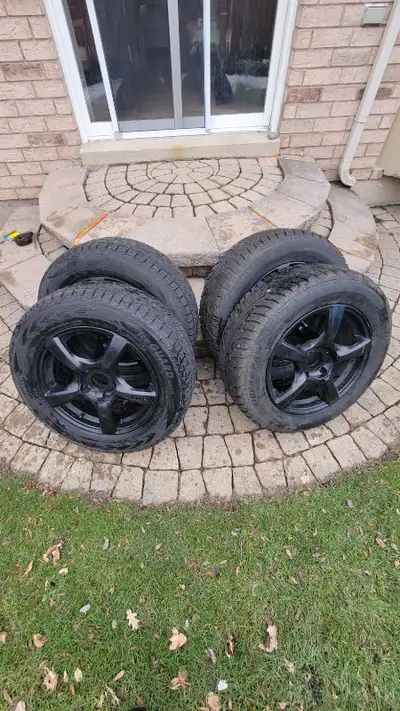 225 65 17 WINTER TIRES used less than 2 months-95% tread left on TOUREN higher quality aluminum Rims...