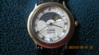 CALINDA unisex quartz Moon/Sun phase analog wrist watch