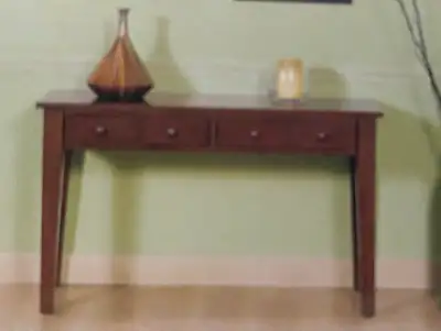 This console table is a versatile accent piece for any entryway or living space, offering both style...