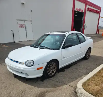 Roughly 200xxx km. Timing belt done last fall,srt4 interior, lowered on coils,has mounted winter tir...