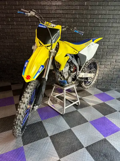 2006 Suzuki Rmz 250 4 stroke Dirt Bike that is fully serviced and running with zero issues. Looked o...