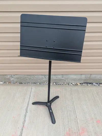 (2) Music Stands: - Profile Music Stand - Unbranded All Metal Music Stand All are adjustable and in...