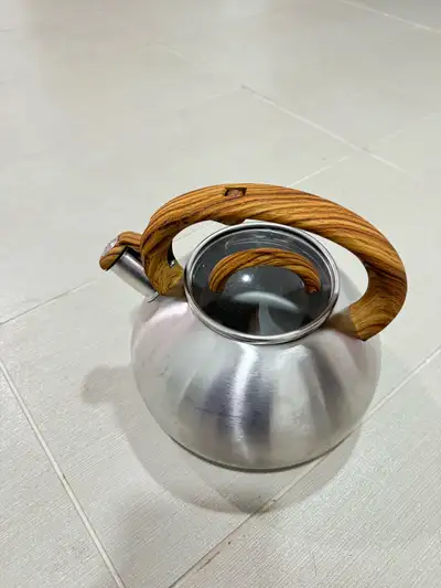 Brew up a storm with this charming tea kettle! It's seen a few sunrises and has a bit of wear to sho...