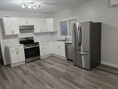 Bright open concept 3 bedroom apartment available ASAP. Includes fridge, stove, dishwasher, washer,...